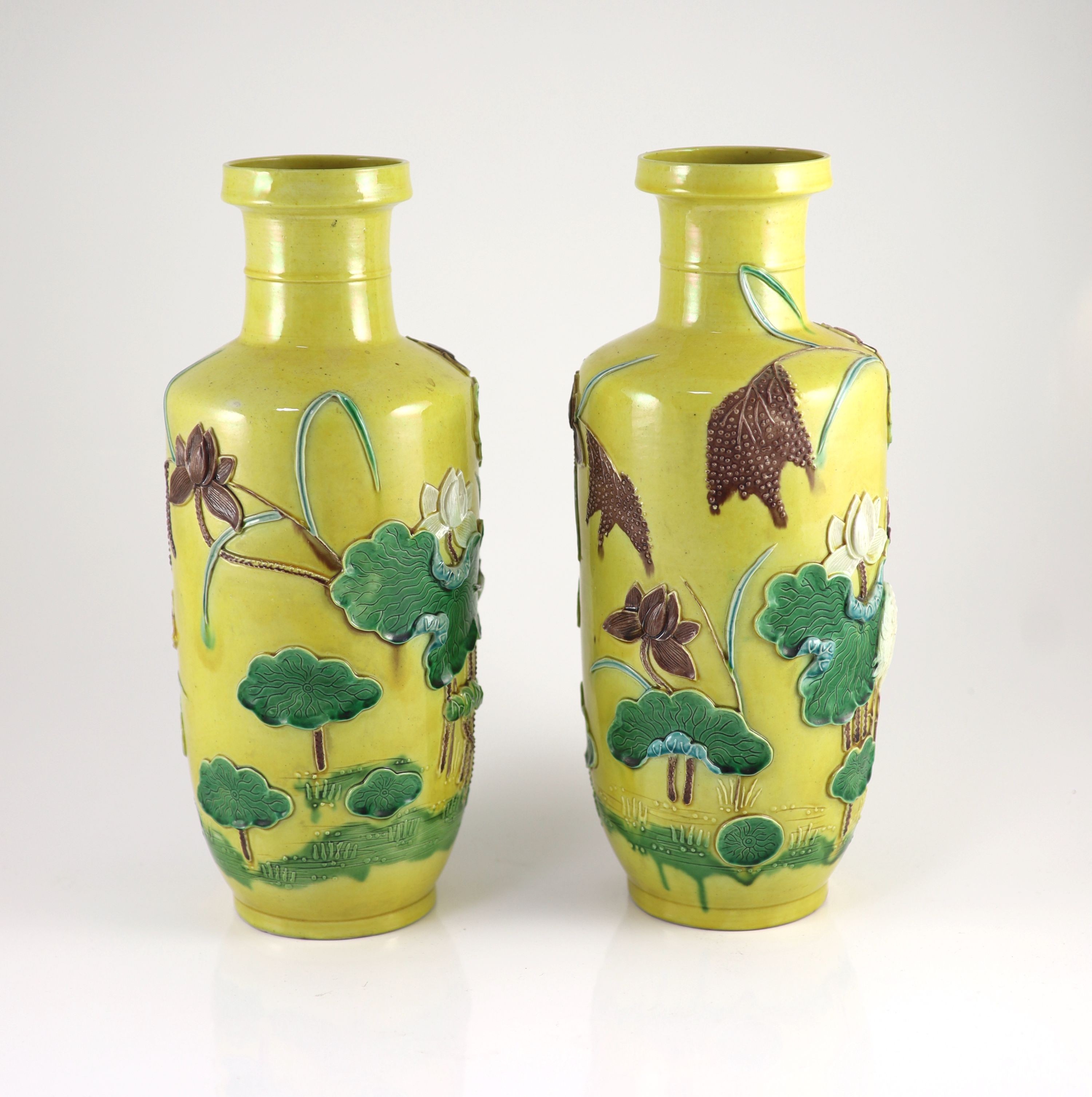 A pair of Chinese yellow ground ‘crane and lotus’ rouleau vases, Qianlong seal mark, early 20th century 34.5 cm high